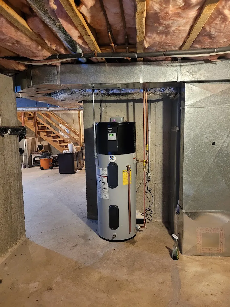 Hybrid heat pump water heater installed in a basement by Justin Nuño HVAC & Plumbing